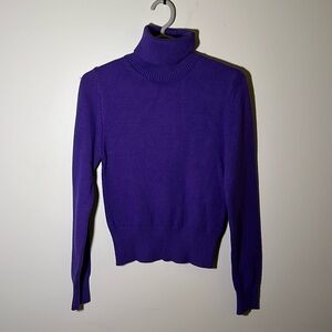 Purple turtleneck sweater. Never worn. From Zara in the Netherlands.